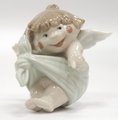 Статуэтка фарфоровая NAO Новорожденный ангелочек (A New Arrival) 6см 02005056