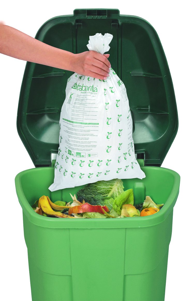 Иллюстрация к статье о компостировании с помощью быстроразлагаемых мешков от Brabantia: мешок и контейнер с пищевыми отходами